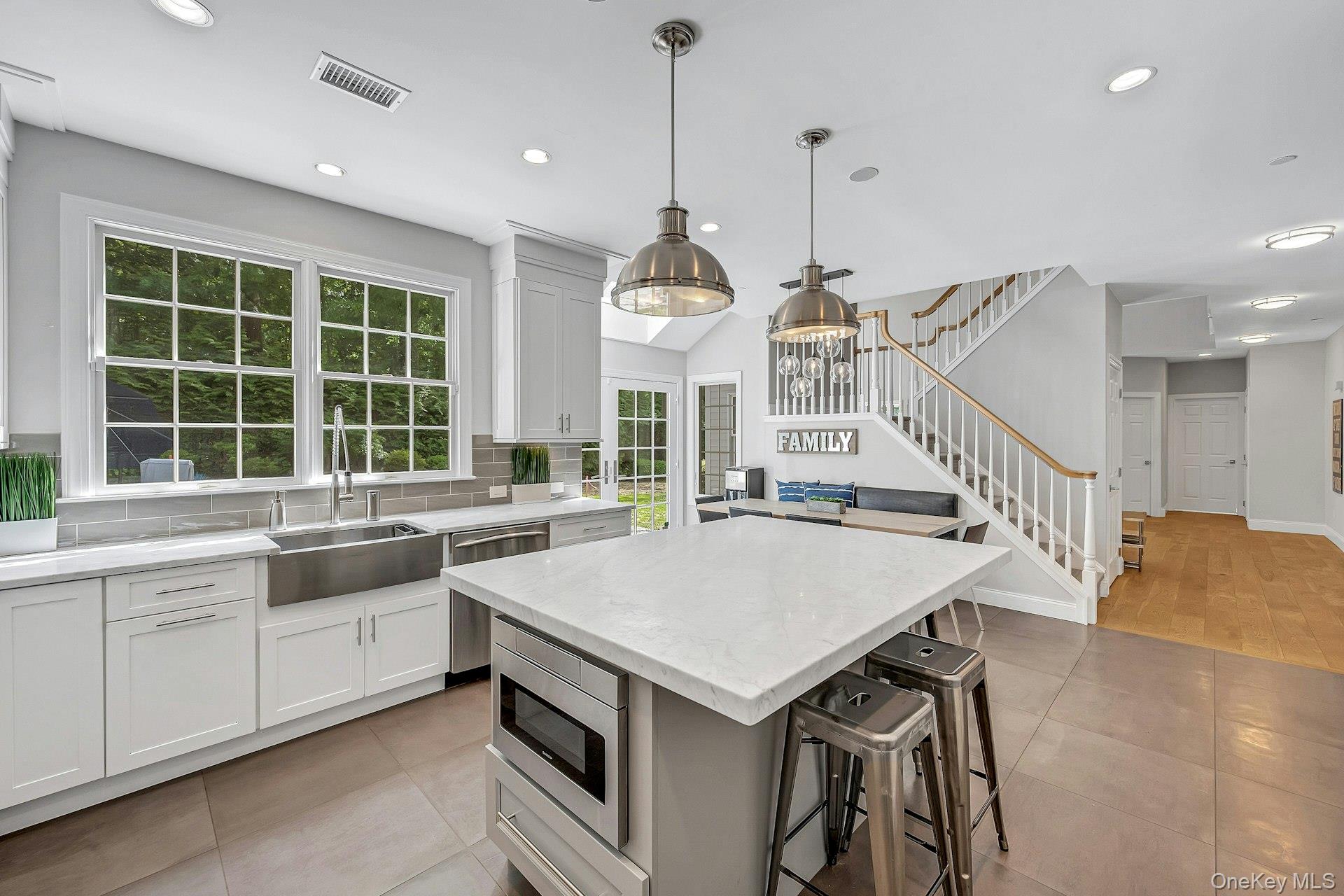 134 Euclid Avenue Ardsley, NY 10502 - Photo 15 of 48 Kitchen with stainless steel appliances, breakfast area, center island.