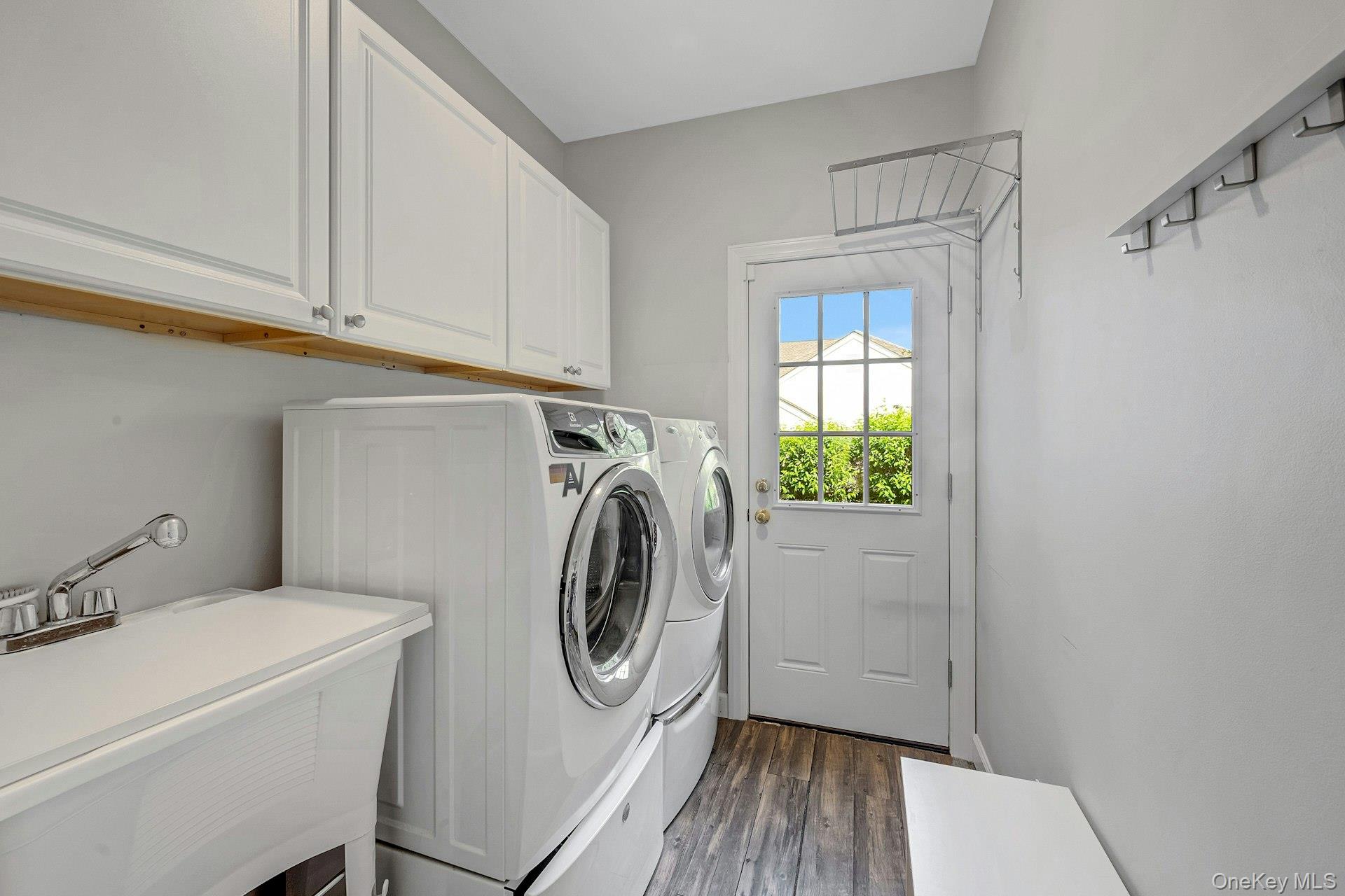 134 Euclid Avenue Ardsley, NY 10502 - Photo 20 of 48 Washroom with washer and dryer. Access to side yard