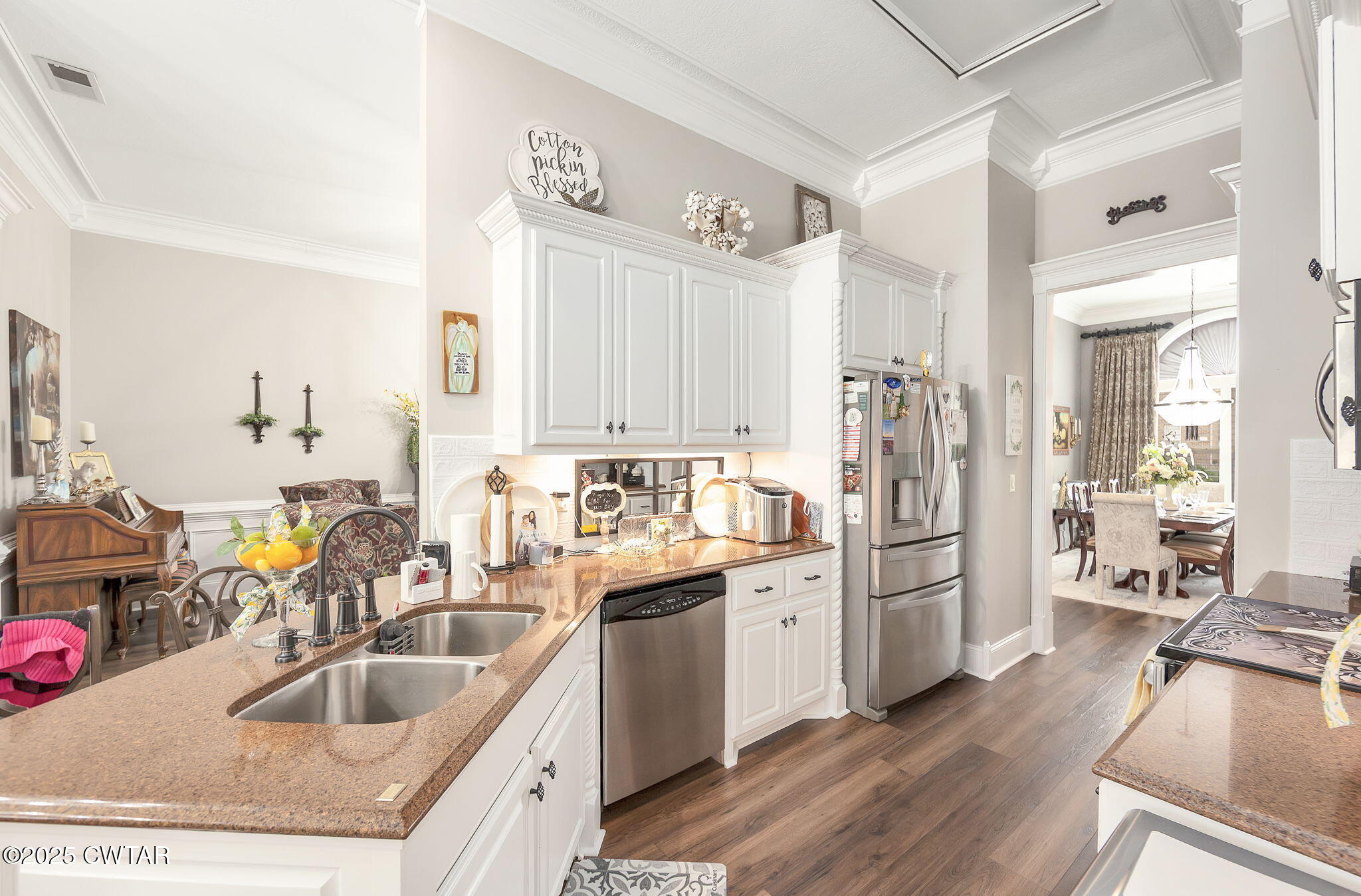9 Dayton Cove Jackson, TN 38305 - Photo 13 of 27 a kitchen with white cabinets sink and stainless steel appliances
