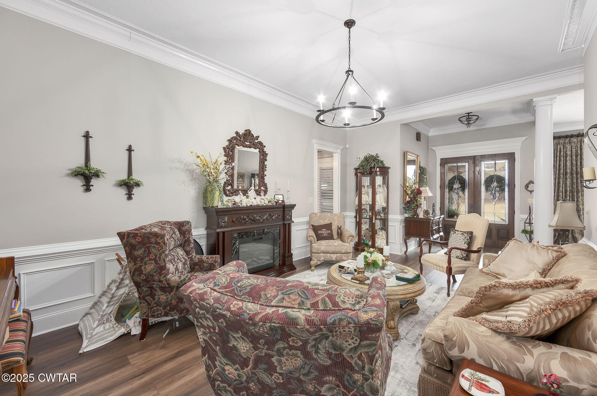 9 Dayton Cove Jackson, TN 38305 - Photo 17 of 27 a view of a dining room with furniture a chandelier and wooden floor