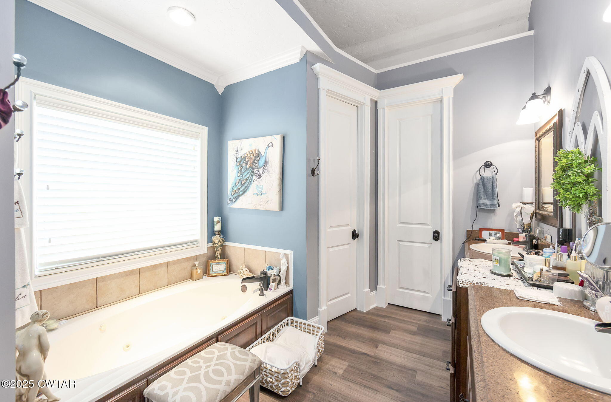 9 Dayton Cove Jackson, TN 38305 - Photo 23 of 27 a bathroom with a tub sink and mirror