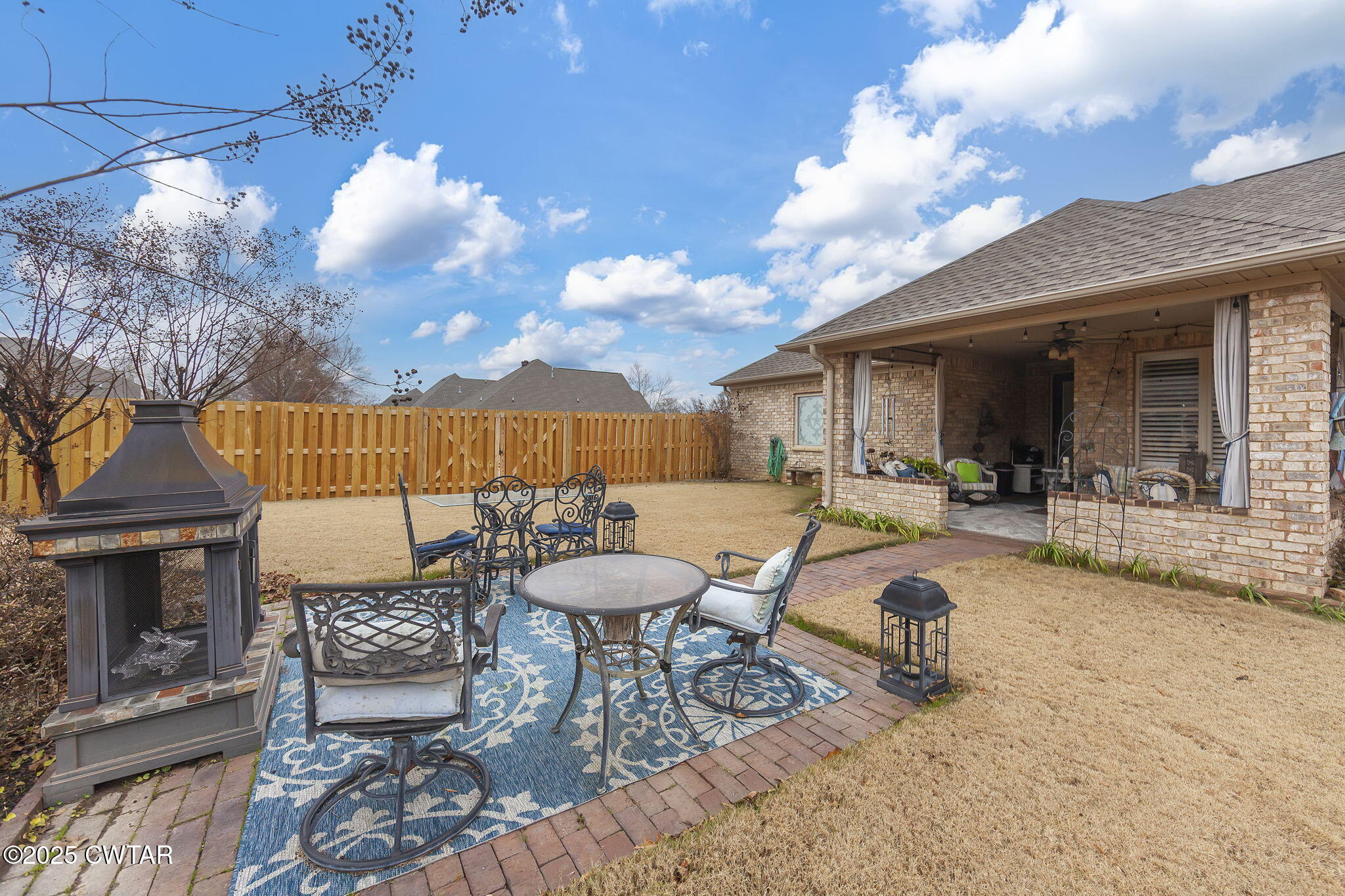 9 Dayton Cove Jackson, TN 38305 - Photo 6 of 27 a view of a dinning table and chairs in the patio