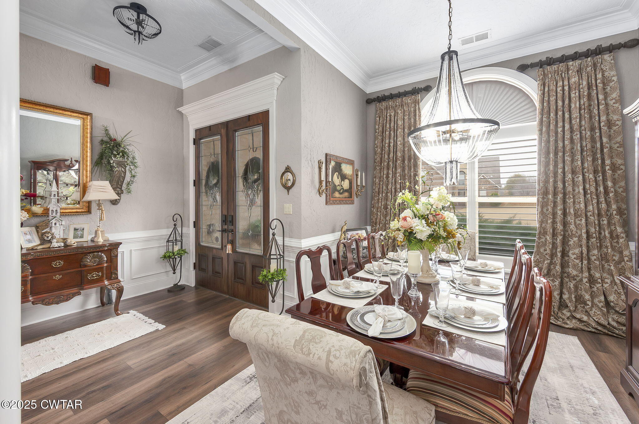 9 Dayton Cove Jackson, TN 38305 - Photo 9 of 27 a view of a dining room with furniture window and wooden floor