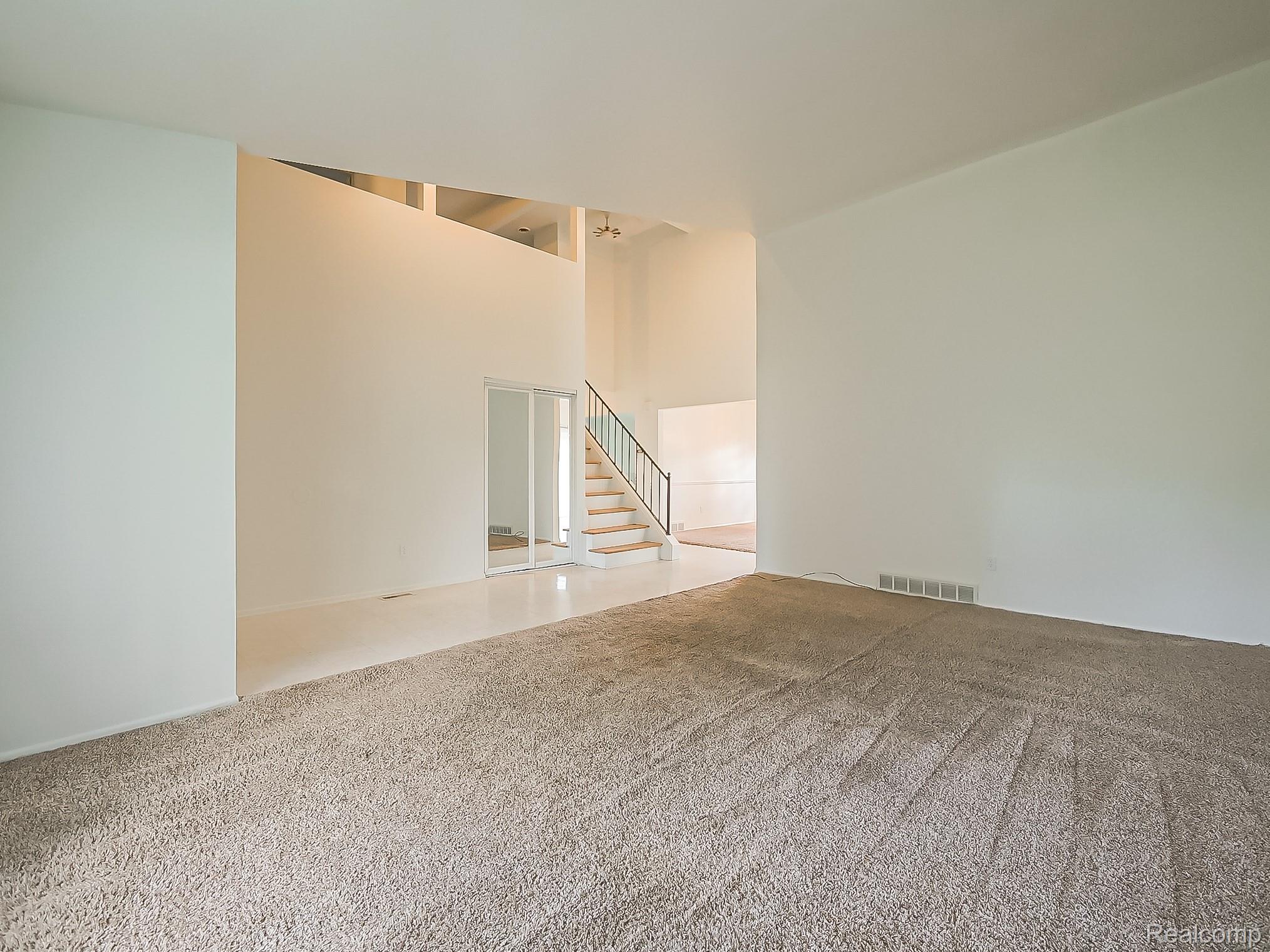 42195 Park Ridge Road Novi, MI 48375 - Photo 11 of 52 High ceilings complement the open-concept design and neutral color palette
