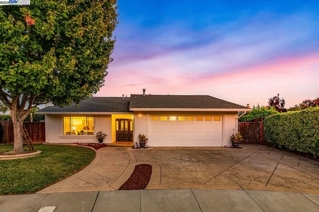 a view of swimming pool with outdoor seating