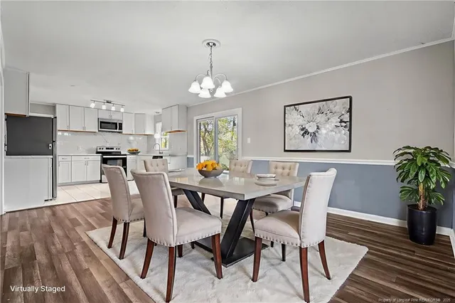 a view of a kitchen with microwave and cabinets