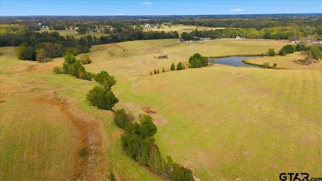 a view of lake with mountain in the background