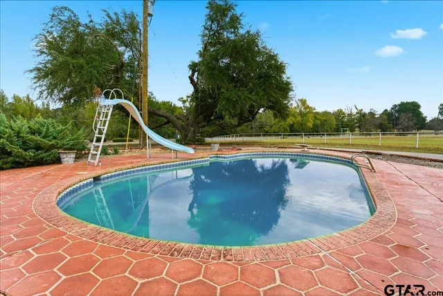 a front view of a house with a garage