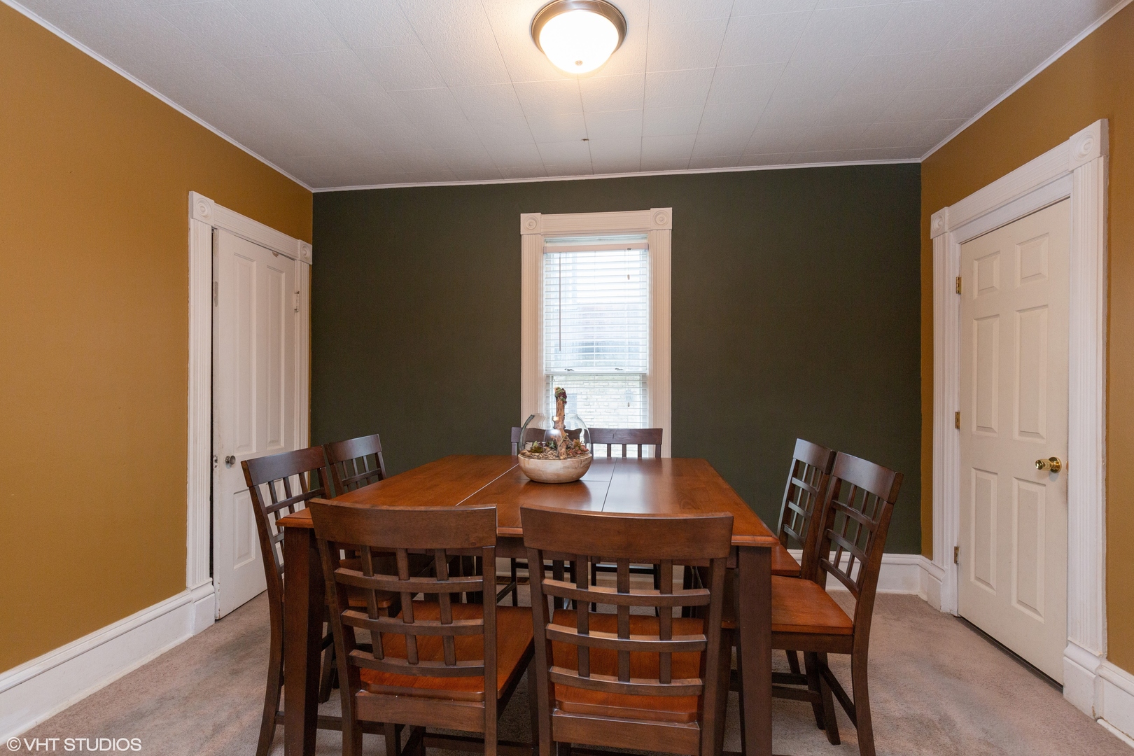 212 Lovell Street Elgin, IL 60120 - Photo 5 of 12 a view of a dining room with furniture and window