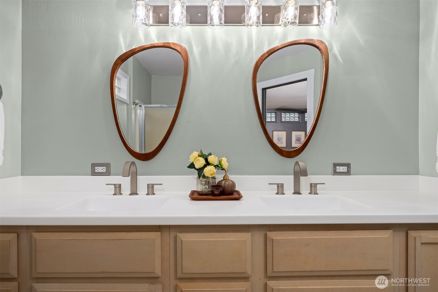 2935 King Street Bellingham, WA 98225 - Photo 21 of 38 a bathroom with a double vanity and a mirror