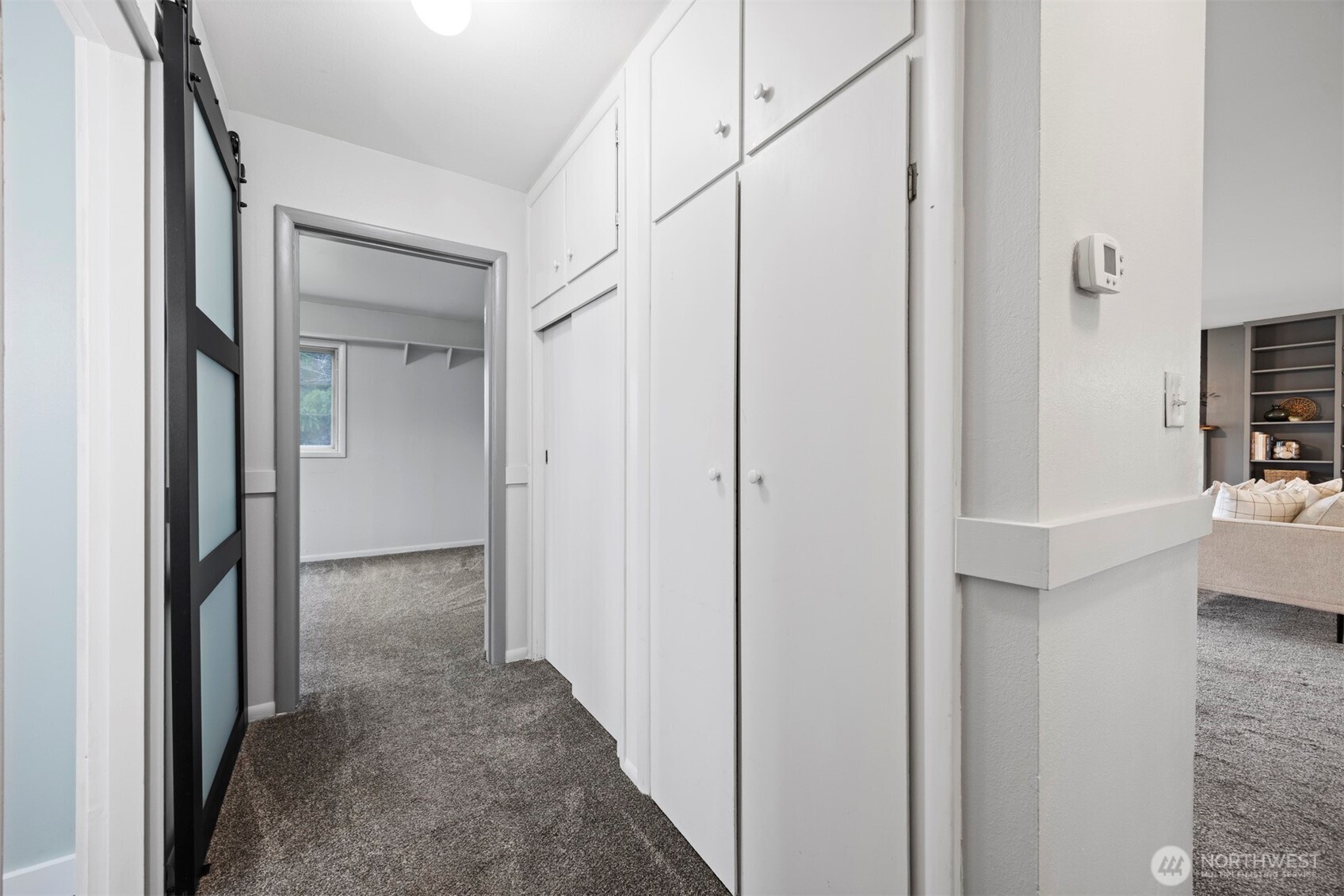 2935 King Street Bellingham, WA 98225 - Photo 22 of 38 a view of a hallway with a wooden cabinets