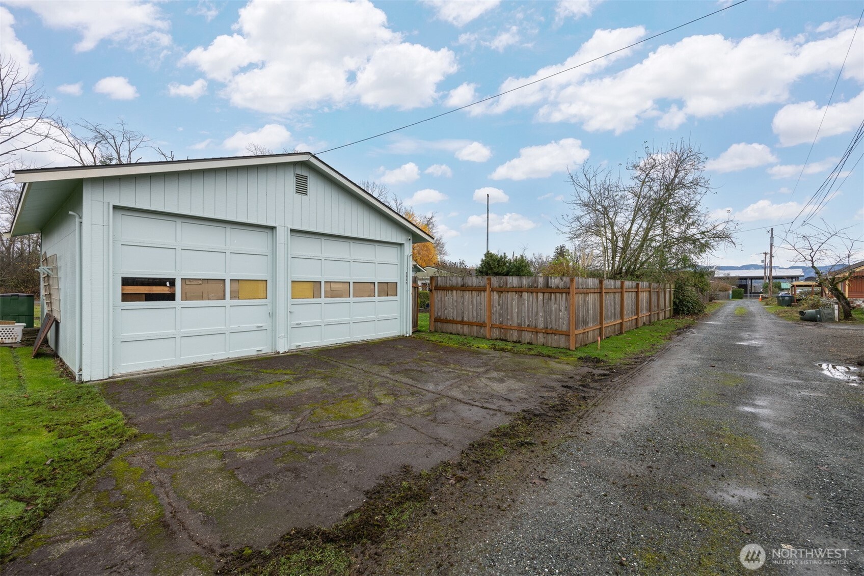 2935 King Street Bellingham, WA 98225 - Photo 37 of 38 a view of a house with backyard and fence