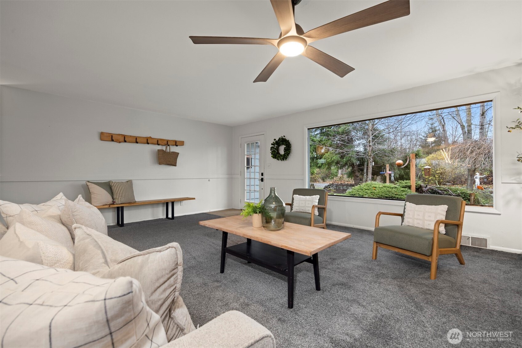 2935 King Street Bellingham, WA 98225 - Photo 5 of 38 a living room with furniture and a large window