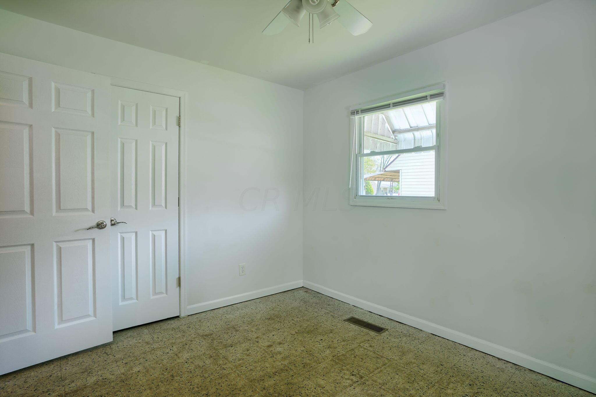 909 Exeter Road Columbus, OH 43213 - Photo 20 of 38 Bedroom 2 Ready for your personal touch. Note the 6 panel doors throughout.