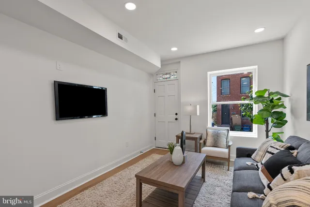 a view of a dining room with furniture