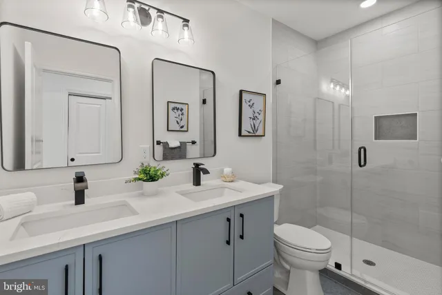 a bathroom with a toilet and a sink