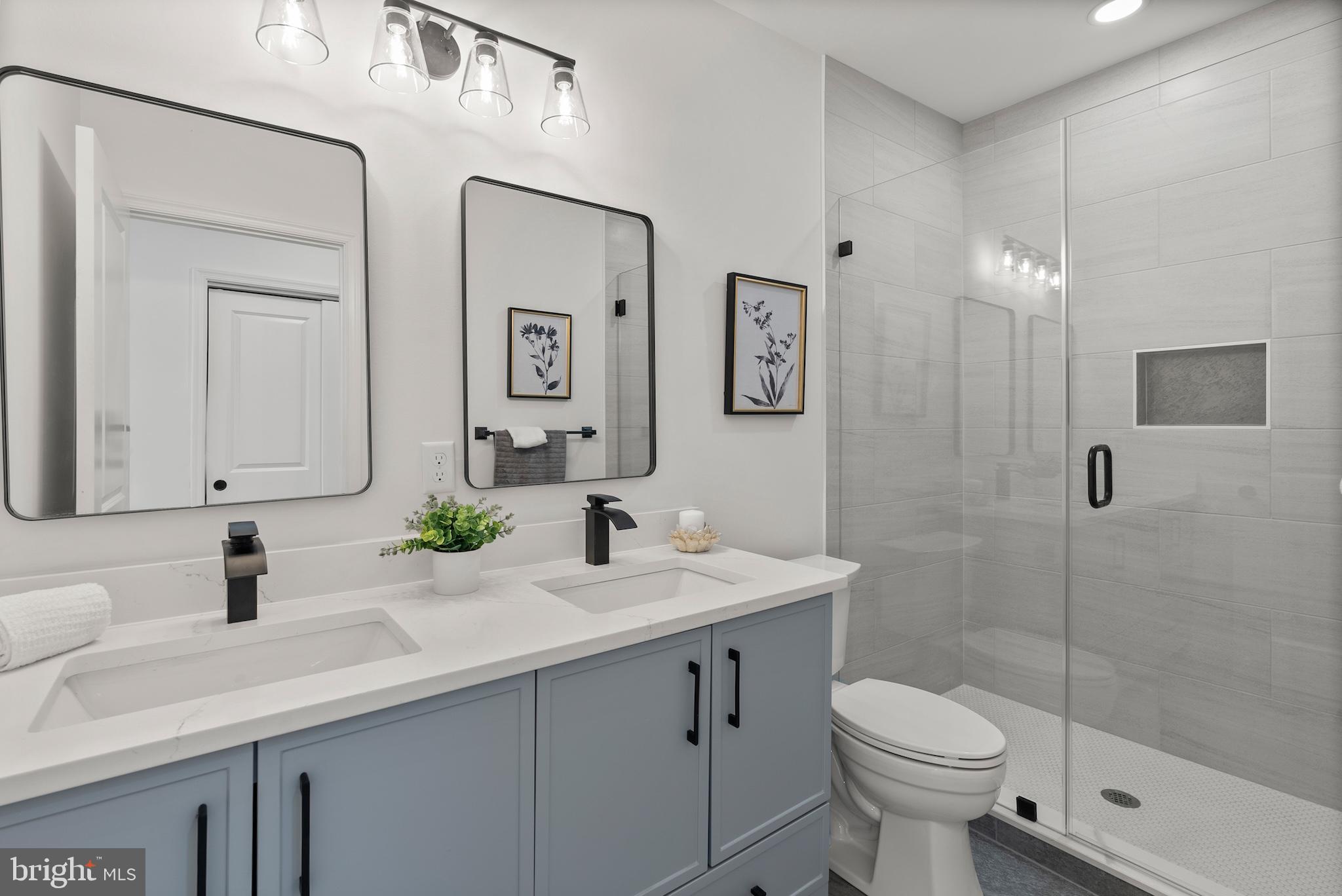 1523 Clarkson Street Baltimore, MD 21230 - Photo 31 of 57 a bathroom with a sink toilet and shower