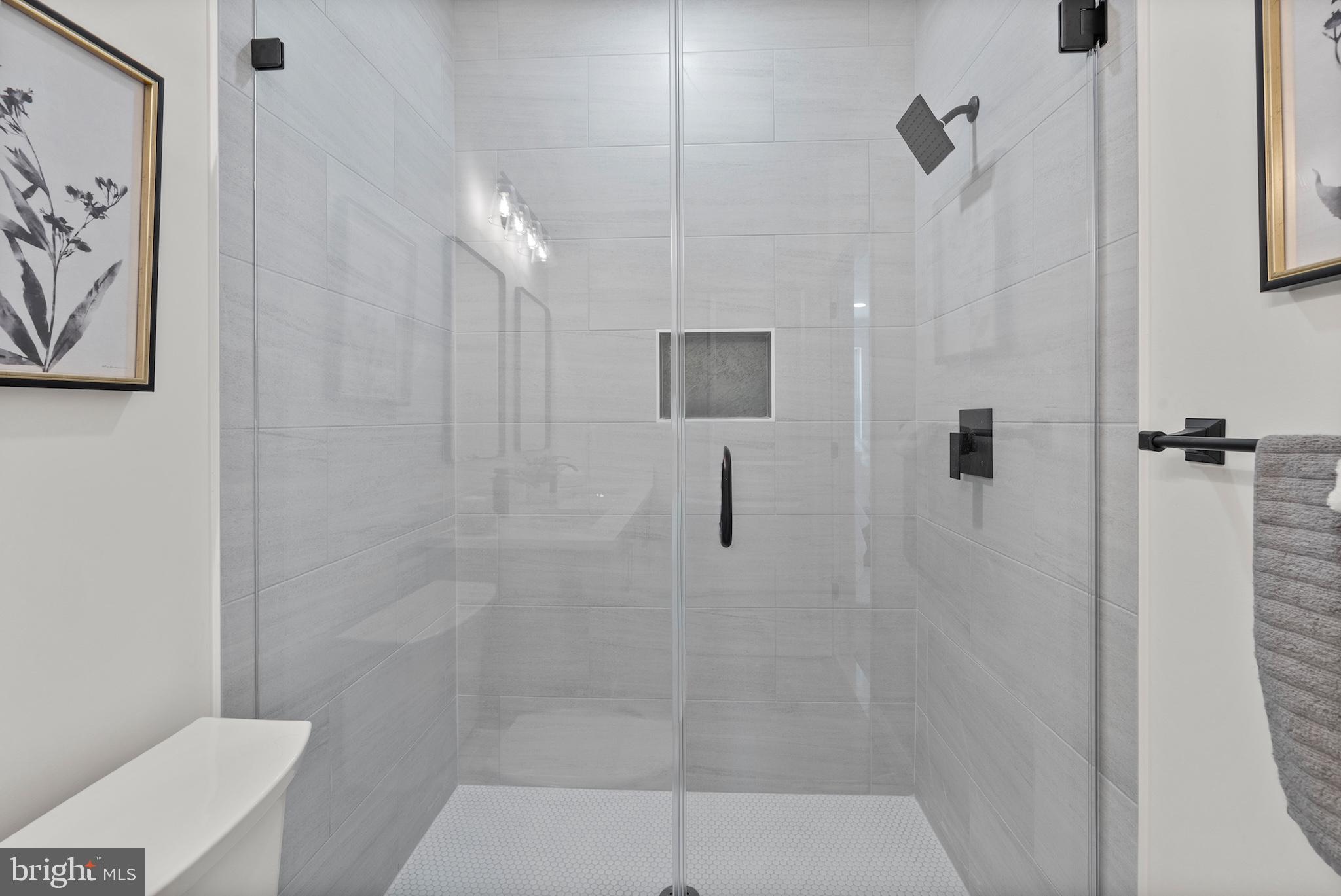 1523 Clarkson Street Baltimore, MD 21230 - Photo 32 of 57 a bathroom with a shower