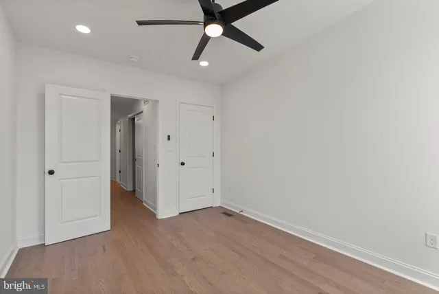 a balcony with wooden floor