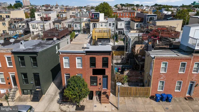 a view of a street with cars