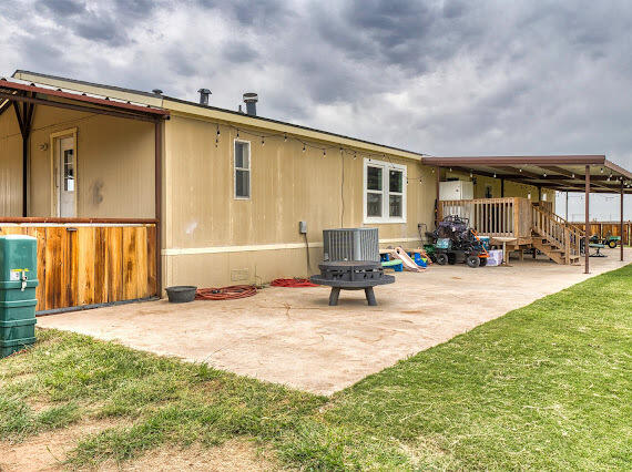 6341 Farm Private Road Levelland, TX 79336 - Photo 36 of 46 a view of a house with a patio