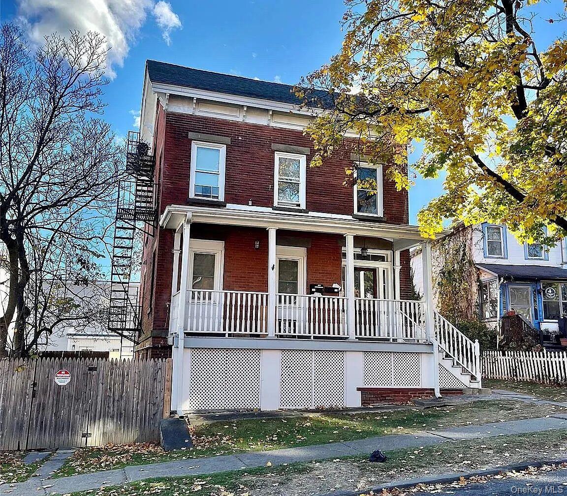 9 South Clinton Street, Unit 2 Poughkeepsie, NY 12601 - Photo 1 of 10 a front view of a house with garden