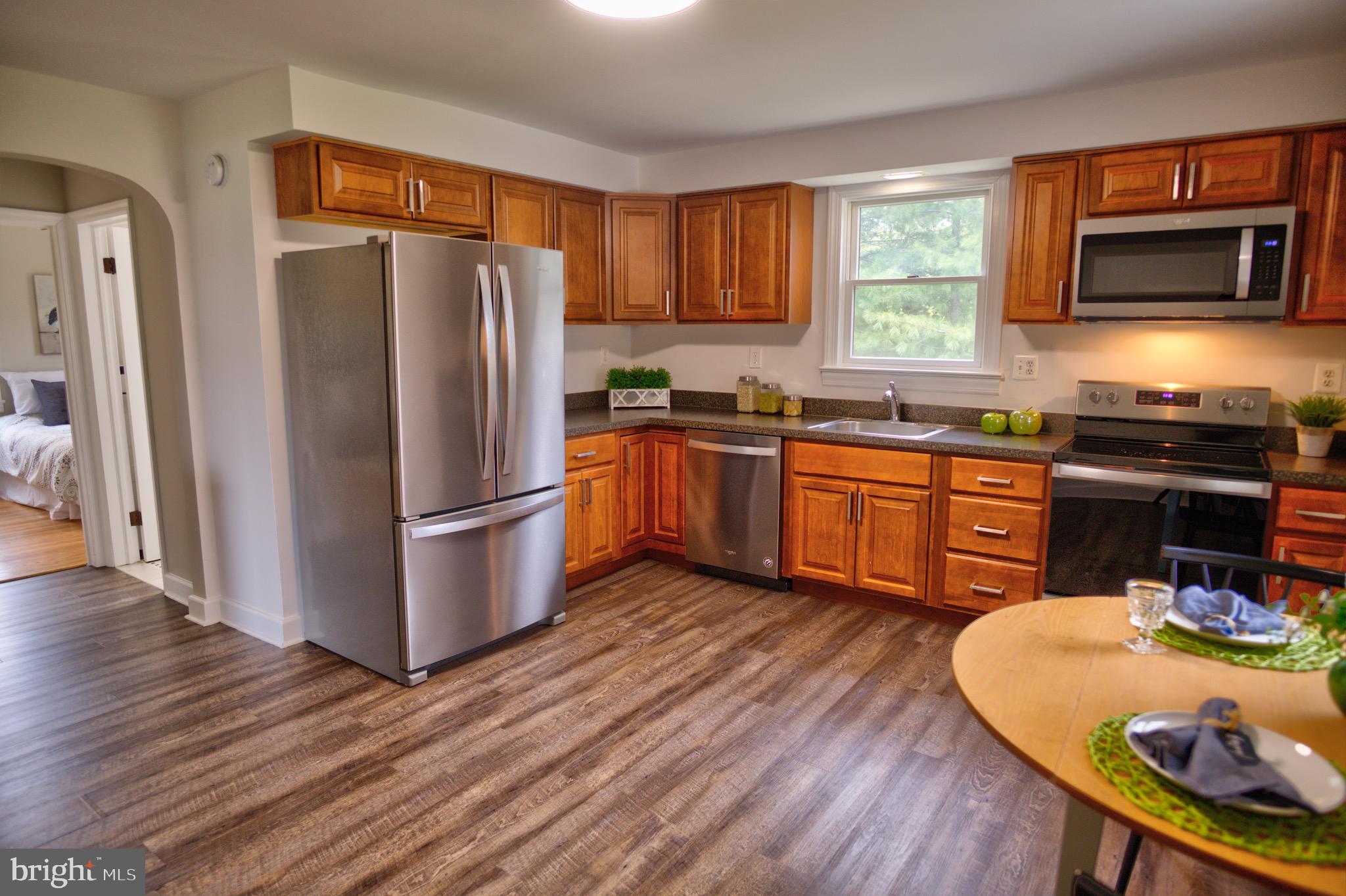 756 Old Stevenson Road Severn, MD 21061 - Photo 17 of 32 Kitchen, brand new appliances and flooring