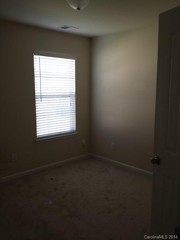 4084 Clover Road Northwest Concord, NC 28027 - Photo 8 of 17 an empty room with a window