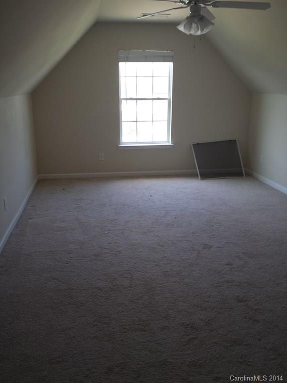 4084 Clover Road Northwest Concord, NC 28027 - Photo 9 of 17 an empty room with a window