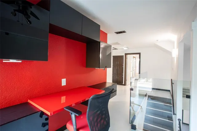 a view of a living room with furniture