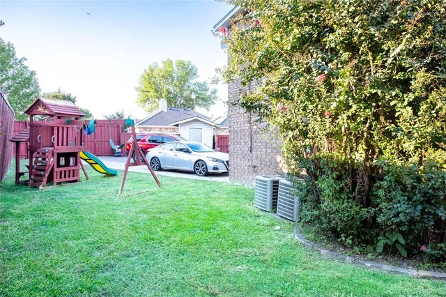 a house view with a garden space
