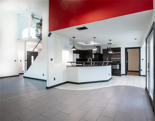 a view of a kitchen with a sink