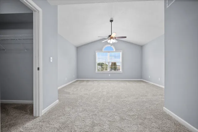 an empty room with a chandelier