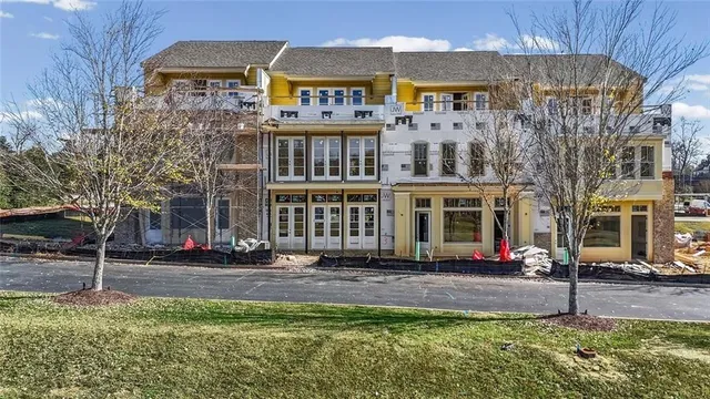 a front view of a building with street view