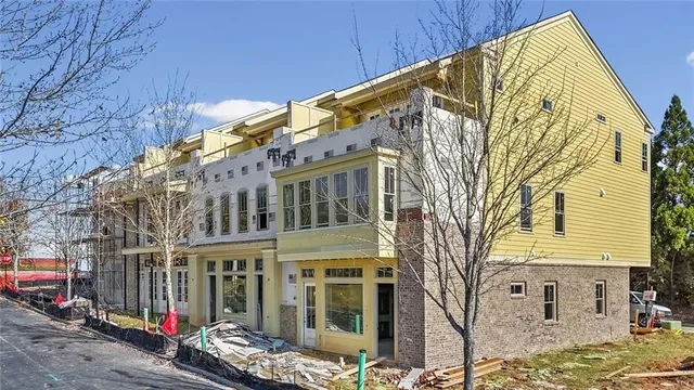 a front view of a building with street view