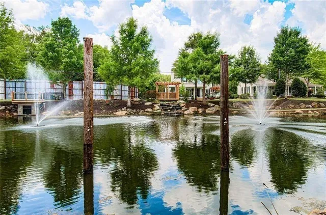 a view of swimming pool with an outdoor space and seating area