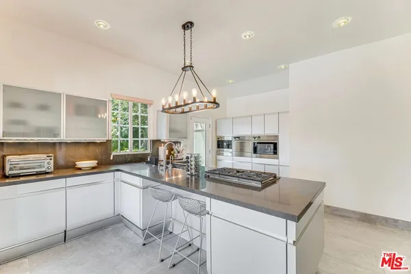 $14,975 | 1410 Stradella Road, Los Angeles, CA 90077