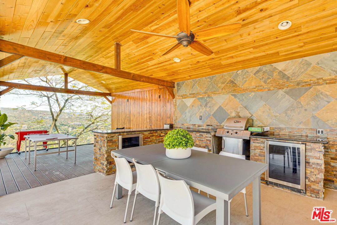 1410 Stradella Road Los Angeles, CA 90077 - Photo 37 of 42 a view of an outdoor space with seating