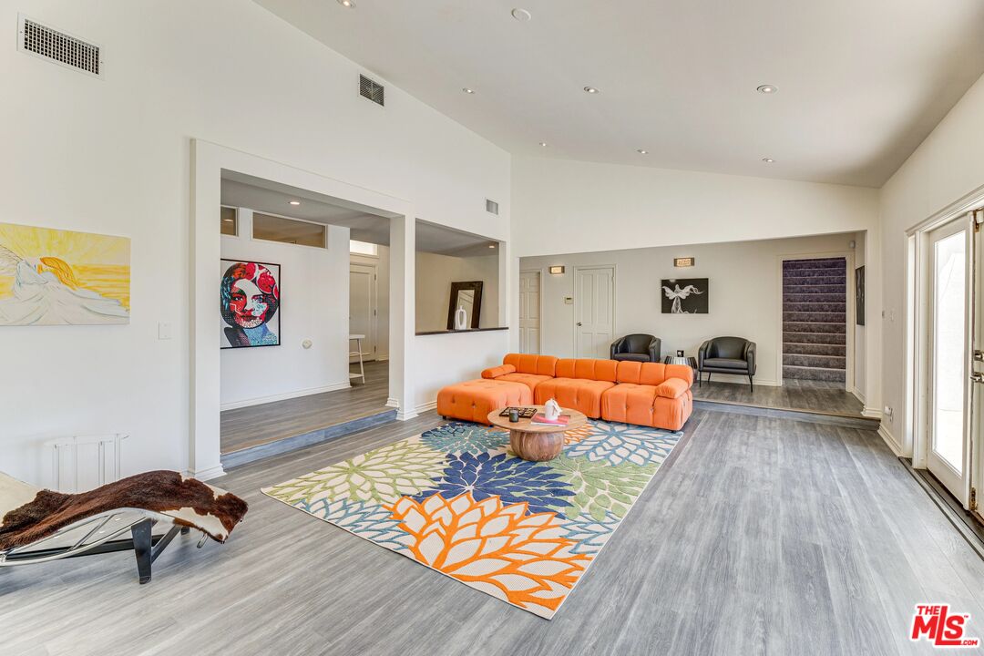 1410 Stradella Road Los Angeles, CA 90077 - Photo 8 of 42 a bedroom with bed and window