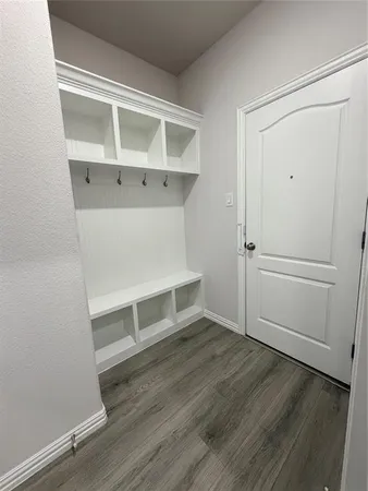 a view of an empty walk in closet