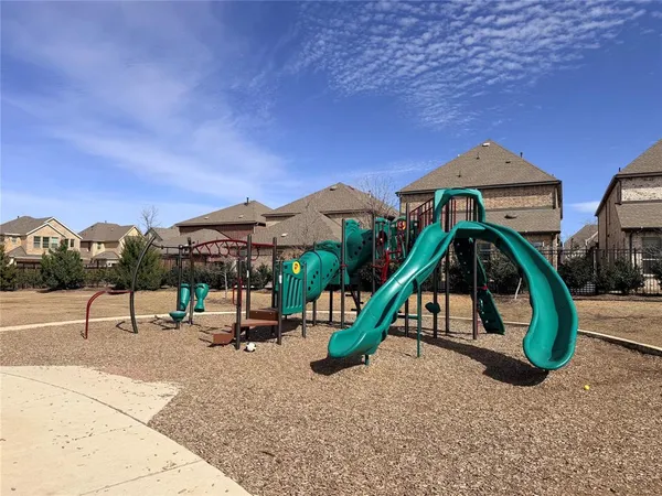 a view of a house with a garden