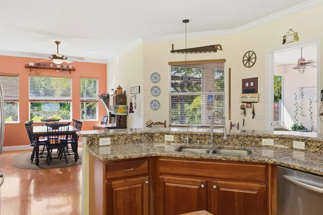 a living room with furniture fireplace and flat screen tv
