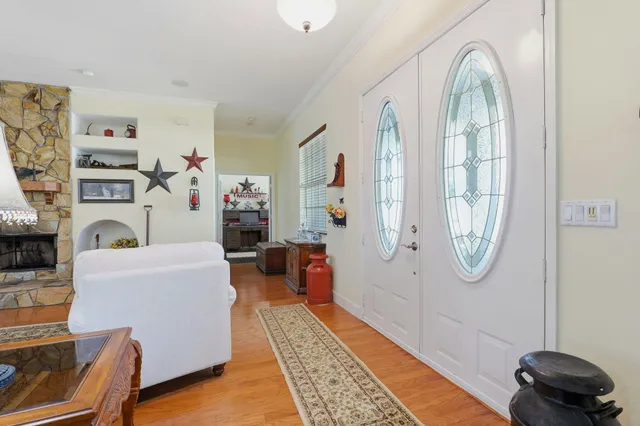 a bedroom with a balcony a bed and a couch