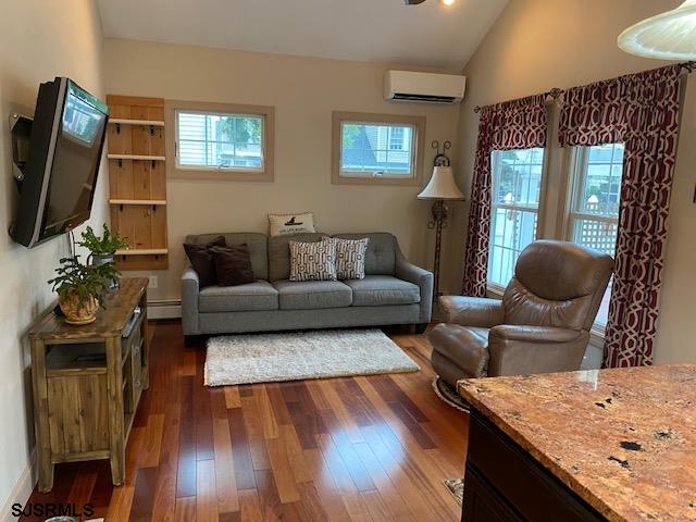 2106 Shore Road Northfield, NJ 08225 - Photo 14 of 44 a living room with furniture and a flat screen tv
