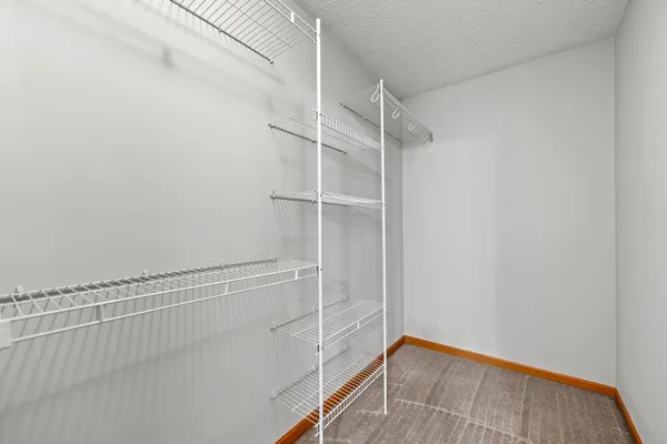 a view of a room with racks on the wall