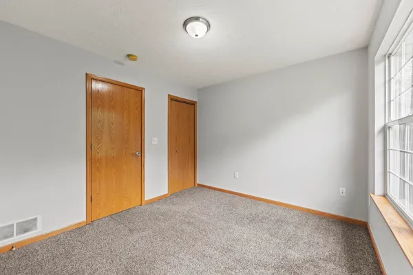 an empty room with windows