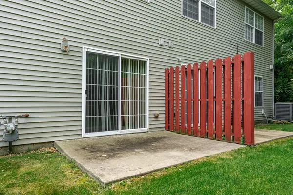 a view of a backyard with a small cabin