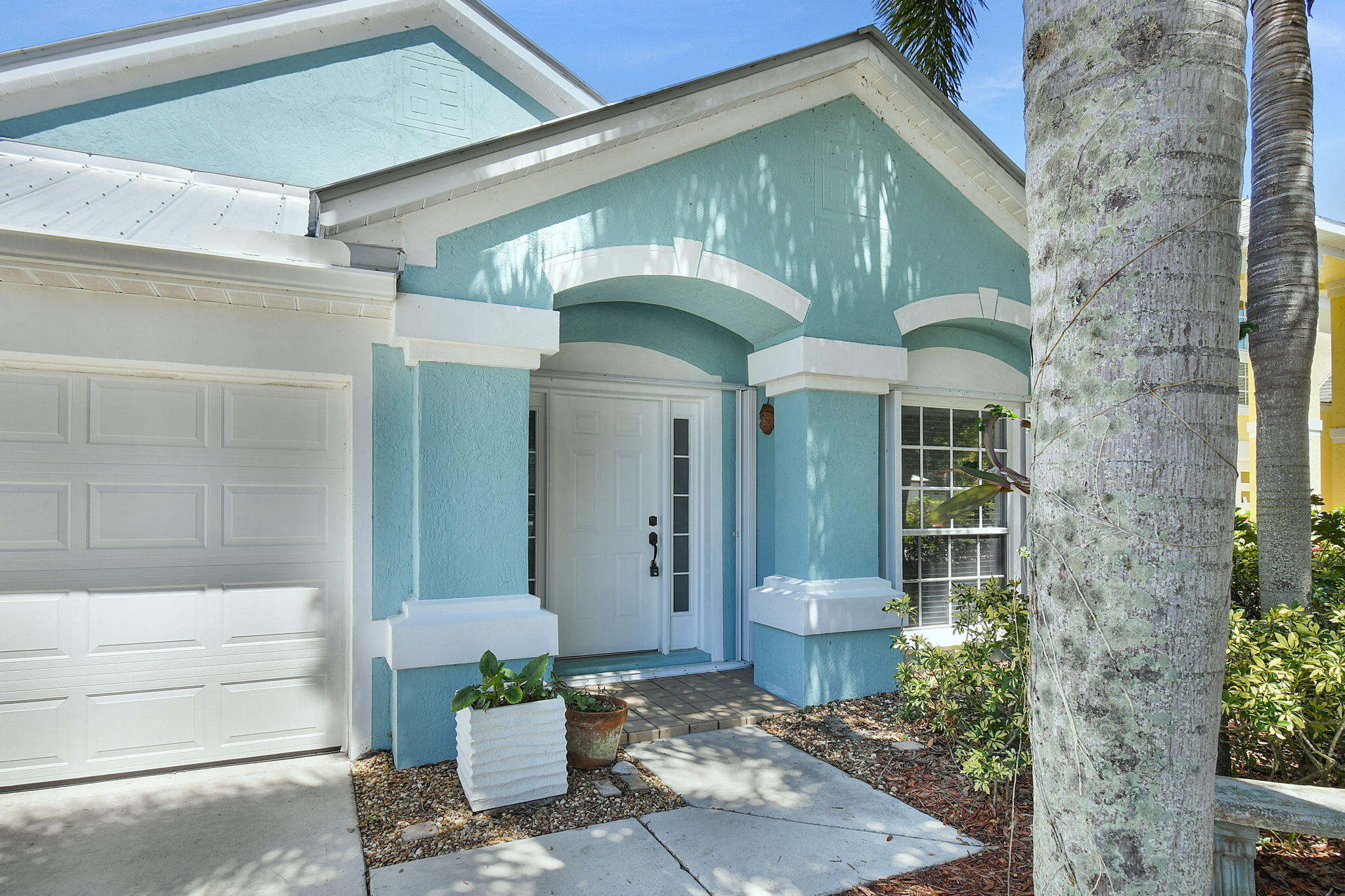 1959 Northwest Marsh Rabbit Lane Jensen Beach, FL 34957 - Photo 3 of 46 Covered Entrance