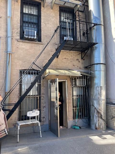 5409 6th Avenue Brooklyn, NY 11220 - Photo 12 of 12 a view of entryway with a front door