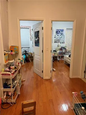 a view of a livingroom with furniture and a workspace